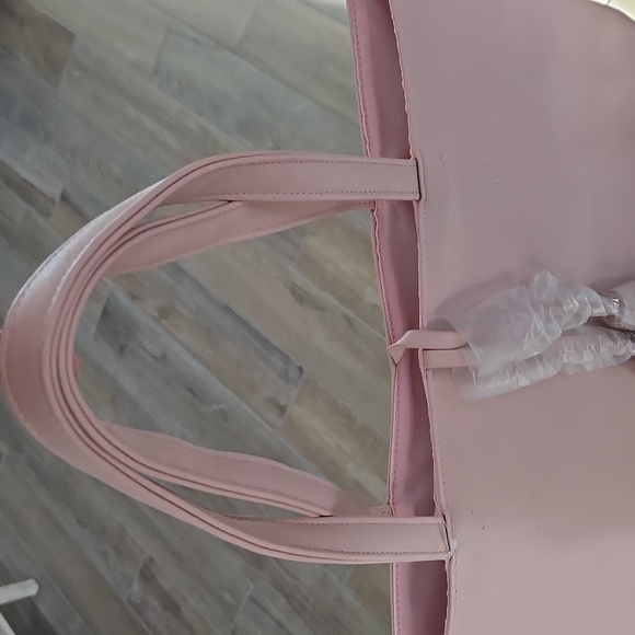 New w/tag never used Light pink tote bag w/ 2 hanging tassles wrapped in plastic - Picture 6 of 6